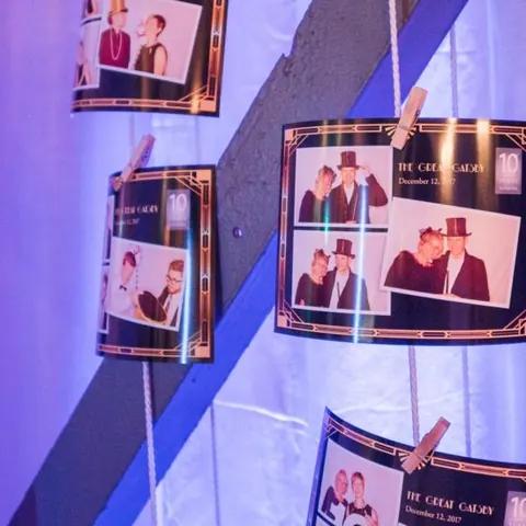 Photo prints with a custom layout on a wall