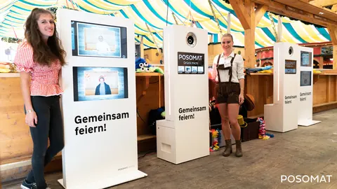POSOMAT photo booths with client branding at a company party
